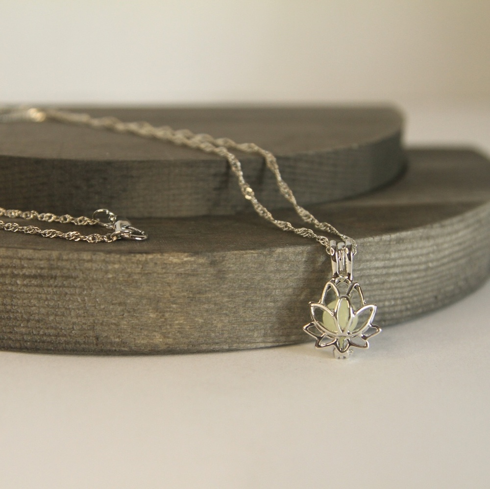 Glow in the dark blue lotus pendant necklace